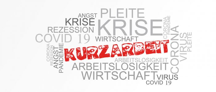 Wortwolke mit Begriffen rund um die Corona-Krise, das Wort Kurzarbeit steht in fetten und roten Lettern in der Mitte